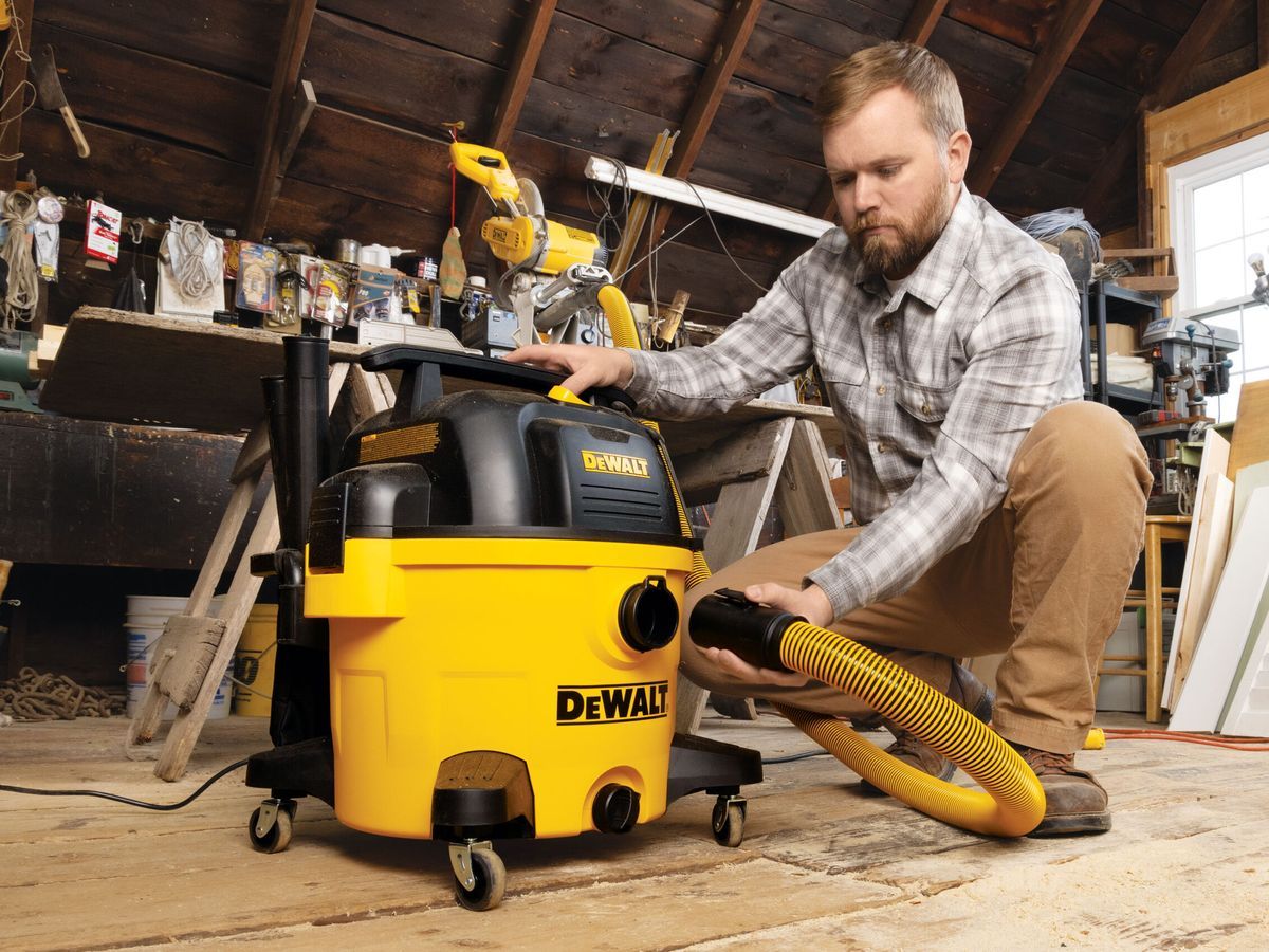 Nathan Gilbert setting up a Dewalt shop vac