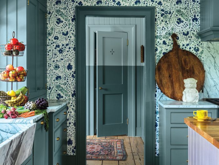 Looking through the kitchen at a two tone door